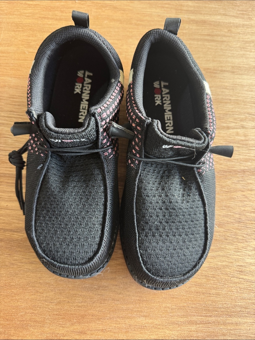 Kids Black Slip-On Athletic Shoes with Pink Accents